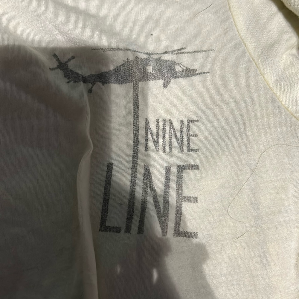 light yellow nine line t shirt small